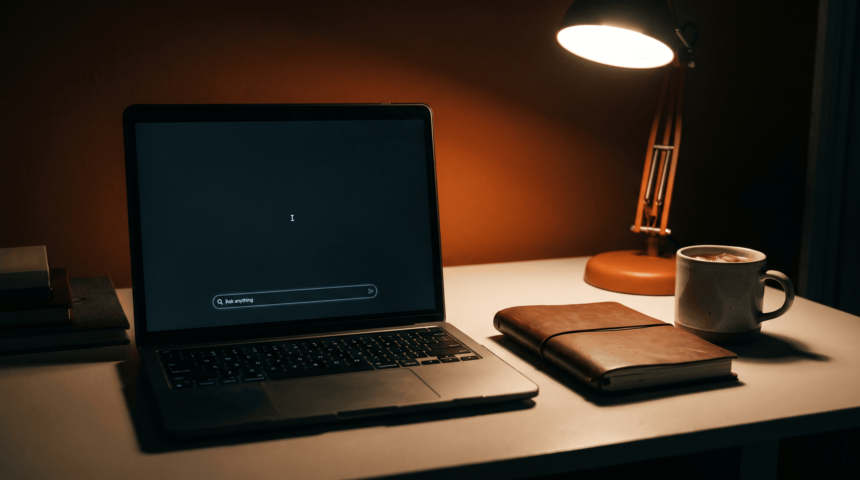 A laptop glowing in a dark home office at night with a minimal chat search bar on screen, the moment before someone learns how to rank in chatgpt