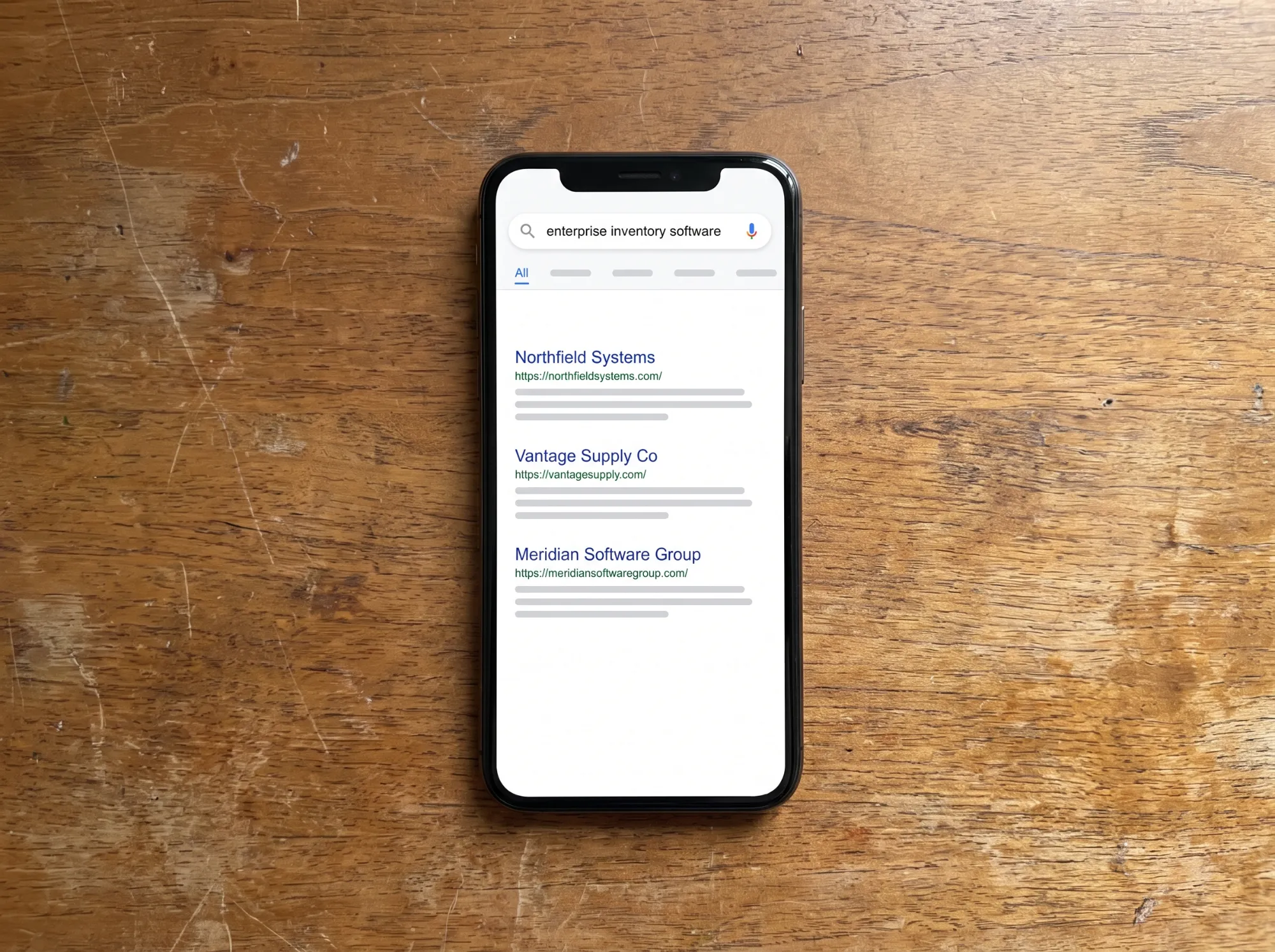 A phone showing Google search results for a B2B software term, with three company listings