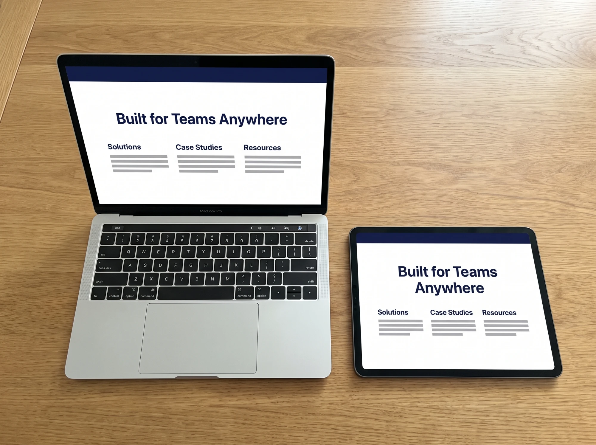A laptop and a tablet showing the same B2B company website, built for teams anywhere