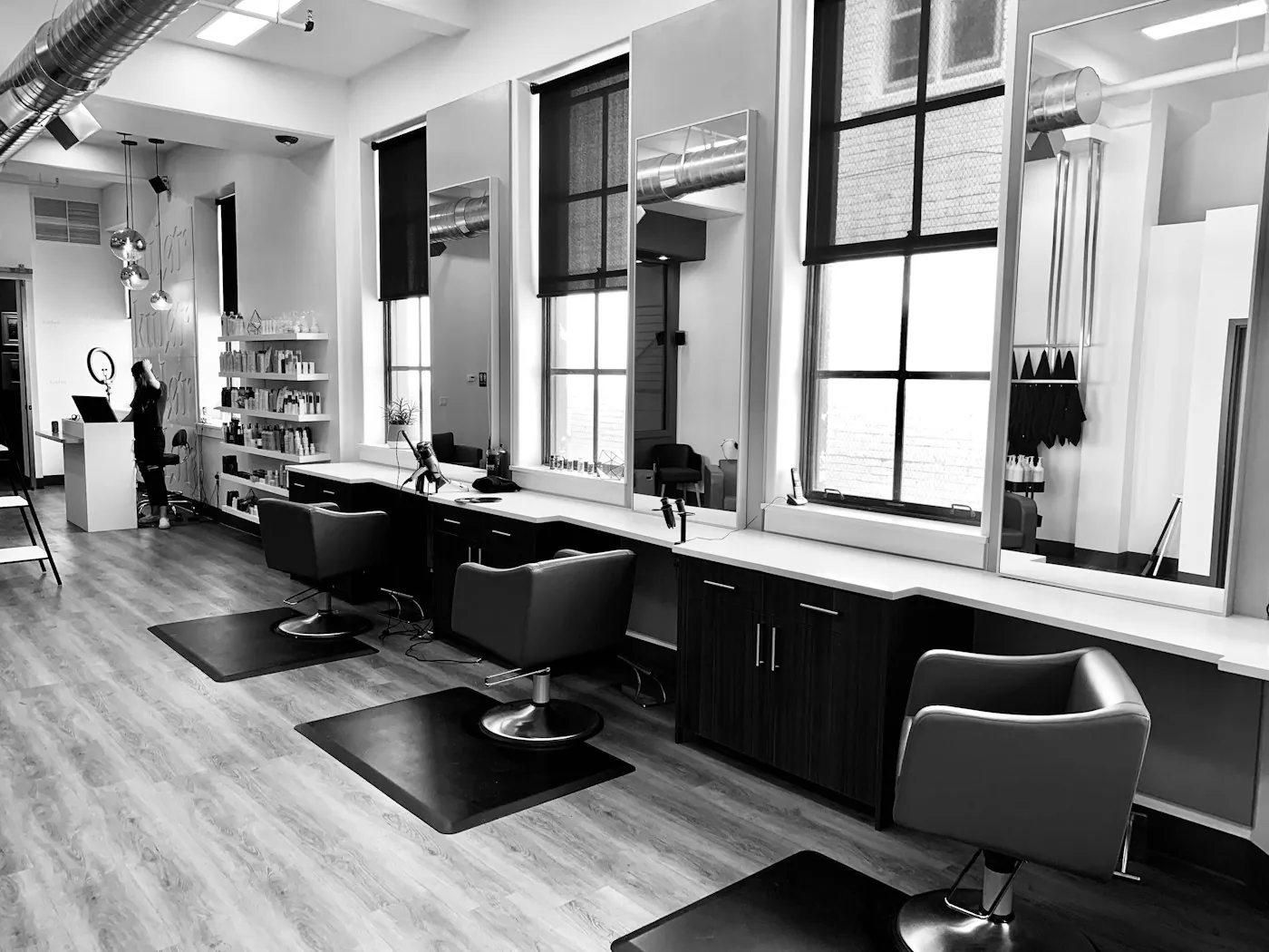 Web design hair salon project showing a bright salon interior with styling chairs ready for clients